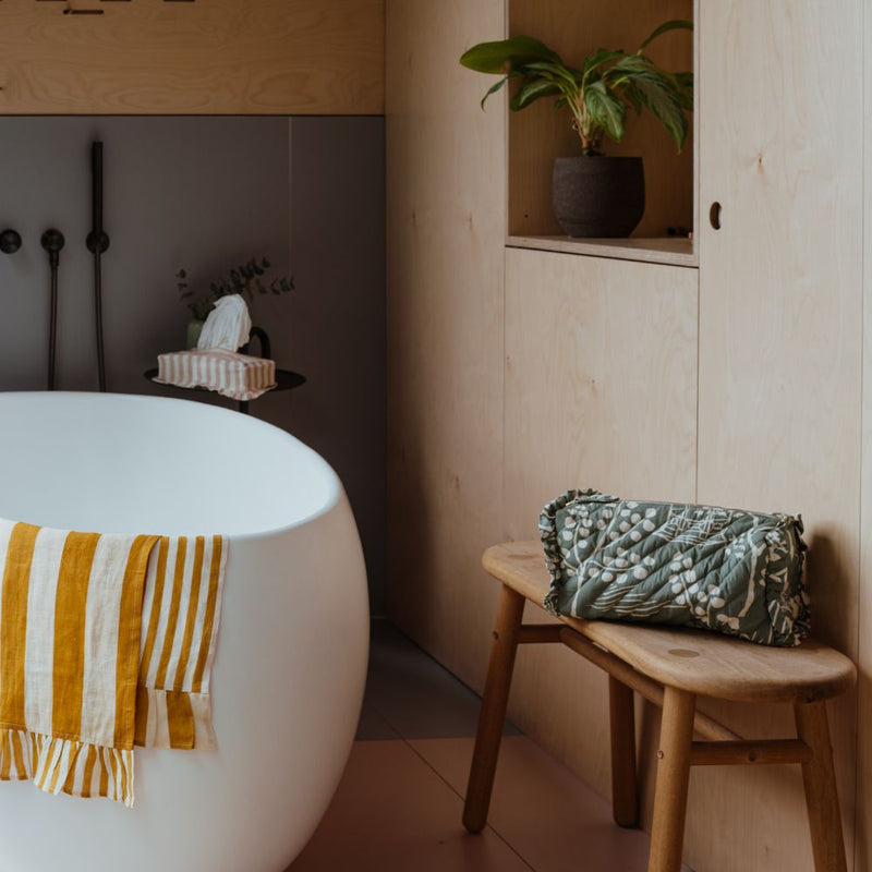 Amuse La Bouche styled bathroom with striped soft furnishings